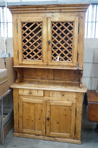 An 18th century and later French provincial pine dresser, width 114cm, depth 44cm, height 195cm